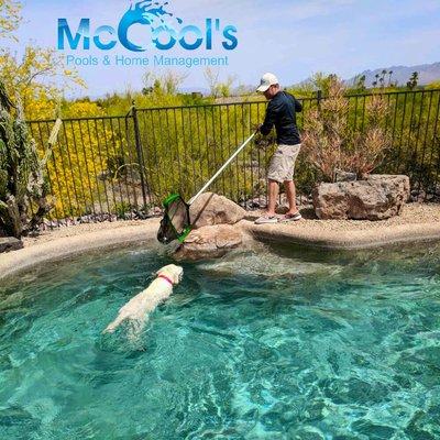 Having a little friend helping him net this pool