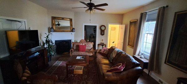 Downstairs sitting area (kitchenette straight ahead to left and full bath to right)