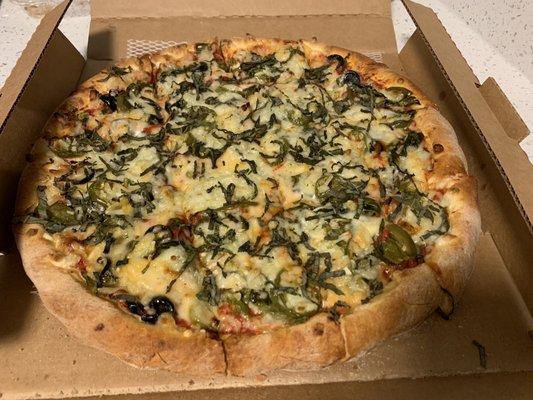 Vegan double dough cheese pizza with jalapeños, olives, basil, and spinach, sooo good!