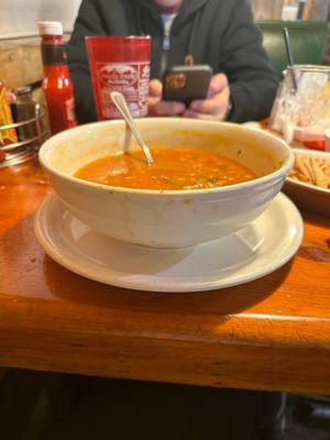 A trough of tortilla soup that was mostly rice.