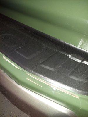 Back bumper luggage strip