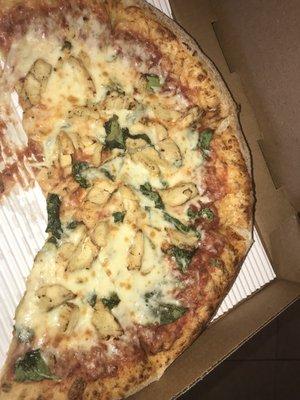 Large fresco specialty pizza comes with chicken and spinach, hold the bacon