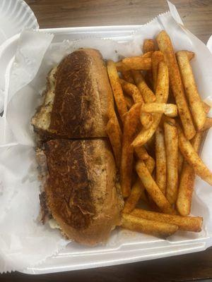 Cuban sandwich w/ seasoned fries.