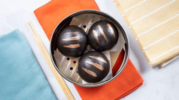 Squid Ink Molten Egg Custard Bao