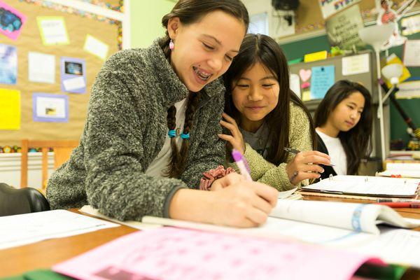 Lower School students in class together.