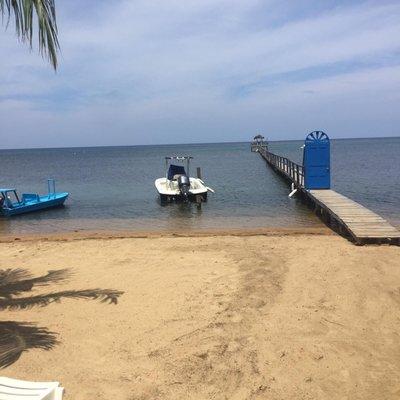 Pier and Motor Boat.  Let's go dive for Lobster!!! Butter makes them better.  Yummy to my tummy!!!!