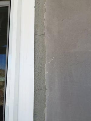 Stucco botched job.