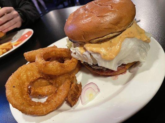 1/2 lb Ivy Mill burger with 1000 island dressing and onion rings