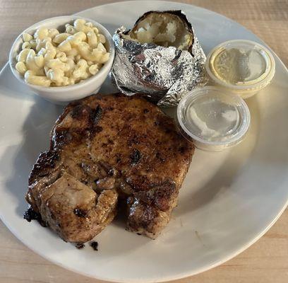 Juicy pork chop with baked potato & incredible mac & cheese