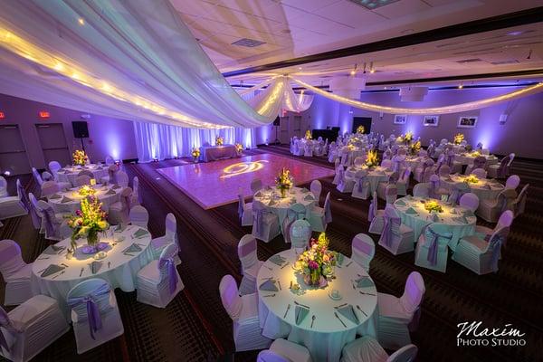 Party Pleasers offers Lit Ceiling Swag, Up Lights, and Wall Drape to make your event look spectacular!