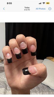 Picture of nails on Monday 11/7 after she "fixed"