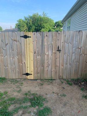 Gate repair to broken plank and replaced latch.