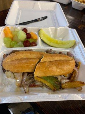 Philly cheesesteak and fresh fruit from the deli. Let's eat!