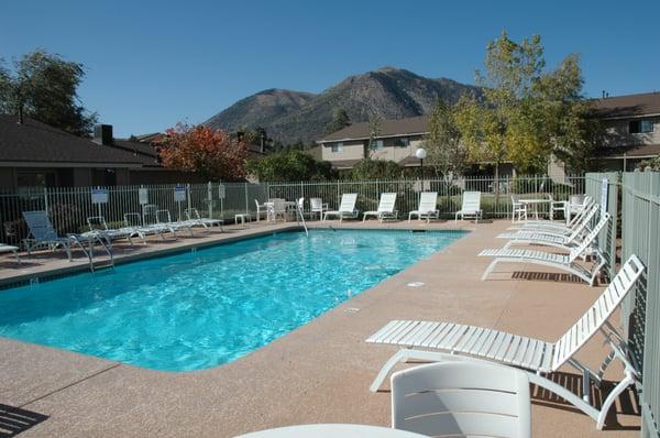 Country Club Meadows seasonal, heated pool, with view of Mt. Elden.