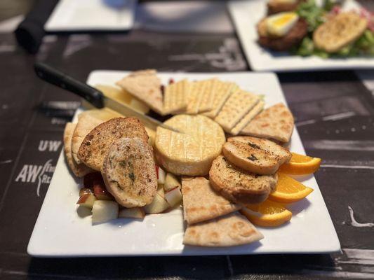 Fried Brie with pita, crackers, bread, seasonal fruit, and honey $15.00