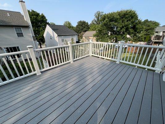 Deck with trex boards and vinyl railings