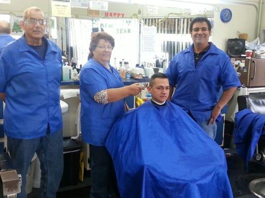 My three favorite barbers: Jay, Adelina, and Fernando.