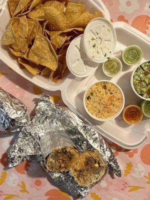 Burrito, rice, chips and guac