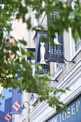 2nd level store front banners on S. Tryon Street.