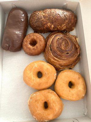 glazed donuts, ham cheese croissant, chocolate glazed bar, raisins croissant, cinnamon cake donut