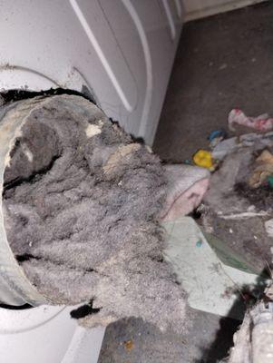 This is what was inside the elbow going out of the laundry room into the garage there was no way for any dryer lint to pass through