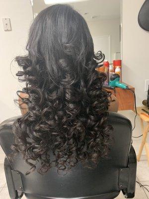 Full sew in extensions with bouncy curls