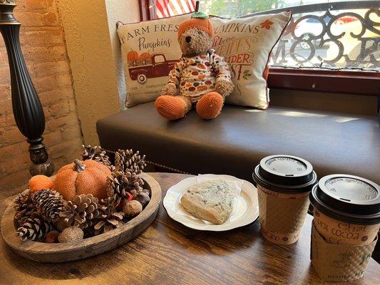 Hot apple ciders & homemade blueberry scone made by the owner's wife Elaine