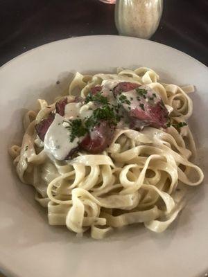 Fettuccine with a Gorgonzola cream sauce and steak medallions