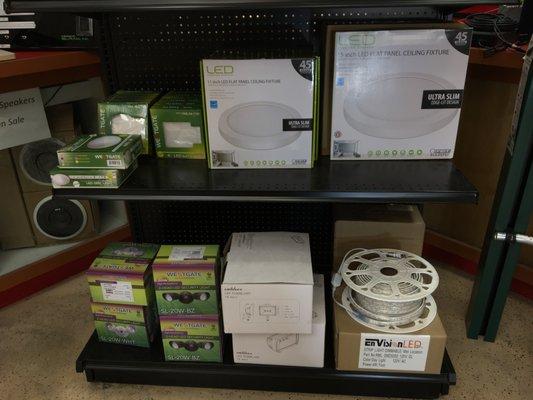 Assorted LED Lights ranging from flat panel ceiling fixtures, tape lights, security lights and more!