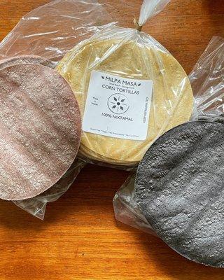 Red (Bloody Butcher corn), yellow, and blue corn tortillas. The yellow and blue are always available