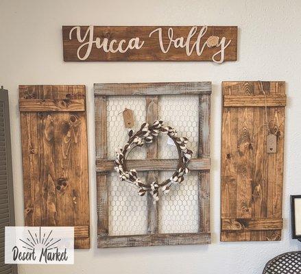 Handmade shutters, window and Yucca Valley sign