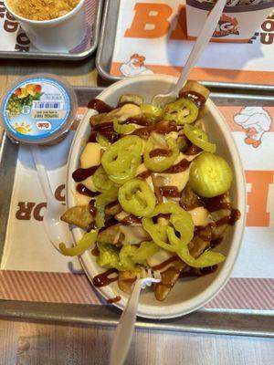 Loaded French fries with special house sauce and banana peppers