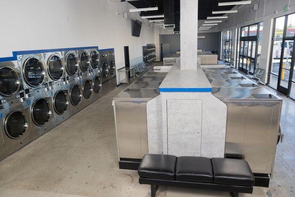 A long view of our 4,000+ laundromat space. 30 washers and 30 dryers!