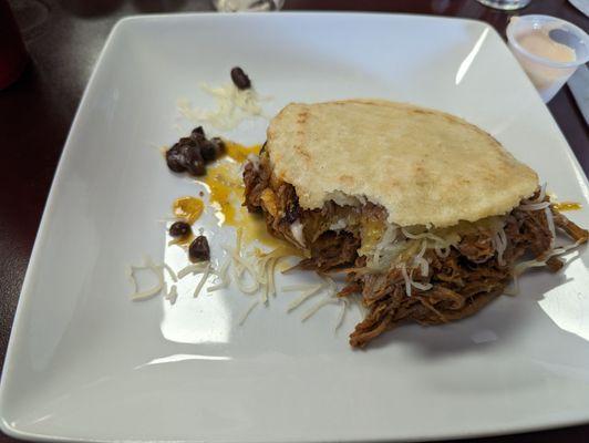 Pabellon Arepas! Deliciousness! Marinated shredded beef with fried plantain, cheese!