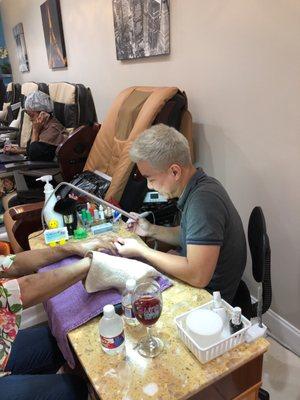 My Favorite guy Ryan working on my Mom's nails. He's great with the nails ladies! Come see him!!