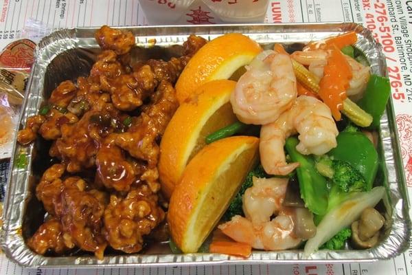 Dragon and Phoenix: General Tso's chicken combined with shrimp, mixed vegetables in tasty white sauce.