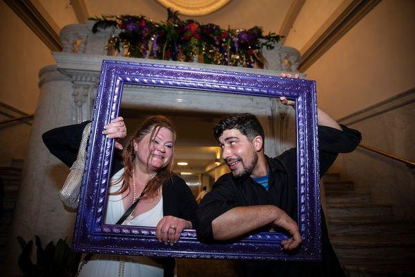 Bride and groom shot at entrance at the end of the night