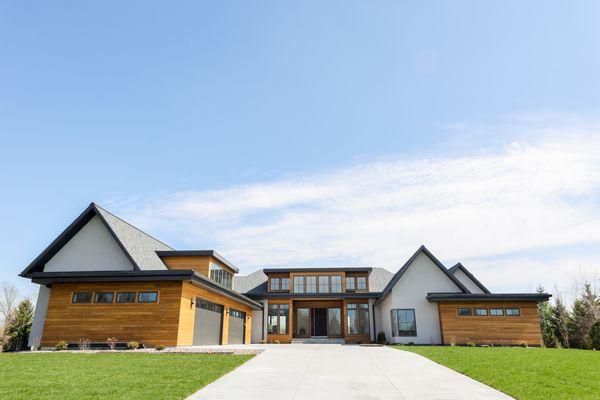 Arbor Wood's thermally modified ash siding for a residential home. We distribute all Arbor Wood products from our NC distribution warehouse.