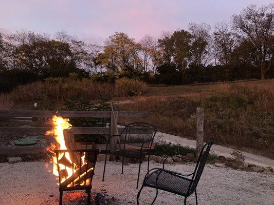 Patio at sunset, grab a spot at the fire pit