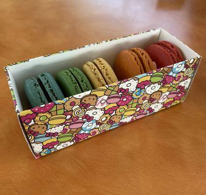 Themed Macarons Flavors: Hazelnut, Pistachio, Lemon, Passion Fruit, and Strawberry Jam