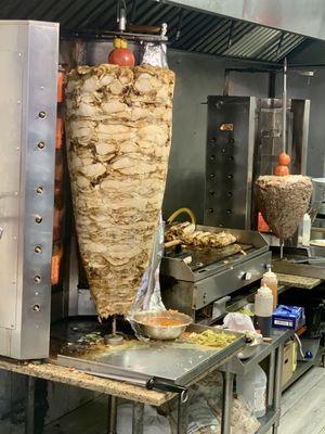 Chicken shawarma in front beef shawarma in the back.