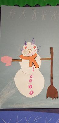 My daughter made a sad kitty snowman...