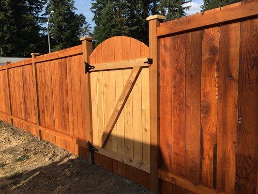 Picture of the gate they installed (the gate hadn't been fully stained yet.)