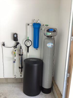 Well Water Softener with UltraViolet Filtration to remove Hardness and to sterilize bacteria.