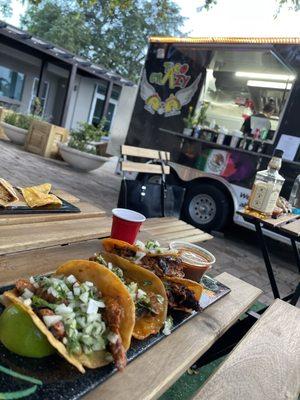 Carnita tacos and birria tacos