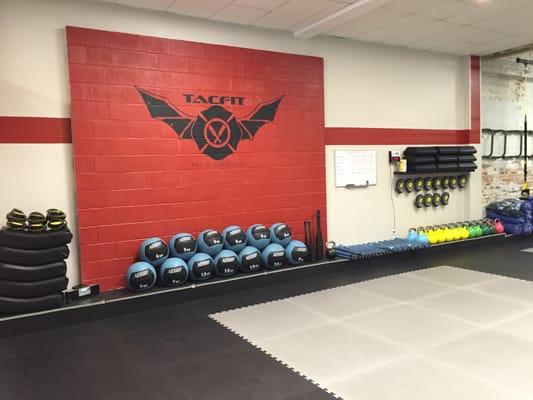 Studio 2 is outfitted with a wall for med ball throws, a TACFIT rig from Xenios USA, and a punching bag for boxing.