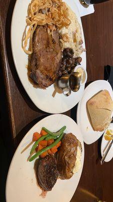 Medium well prime rib and top sirloin w/ veggies, garlic mash and potato only butter.