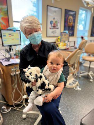 this sweet 9 month old came for a visit with his sister and he's ready to have his one tooth cleaned!