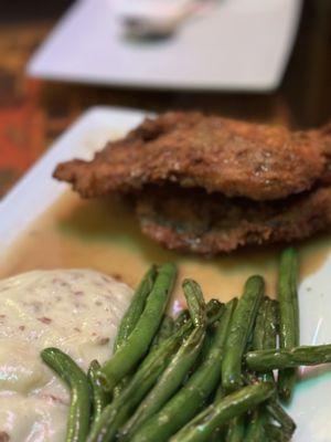 Fried chicken dinner comes with sauté string beans and the most silky, with a bit of chunk, sour cream mashed potatoes