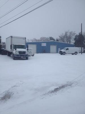 Trucks outside in the snow